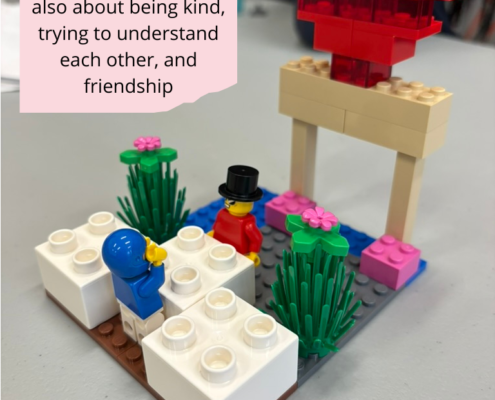 Red heart in legos to symbolize that working together is also about being kind, understand each other and friendship.